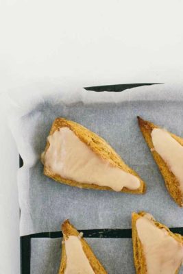 pumpkin scones on baking sheet