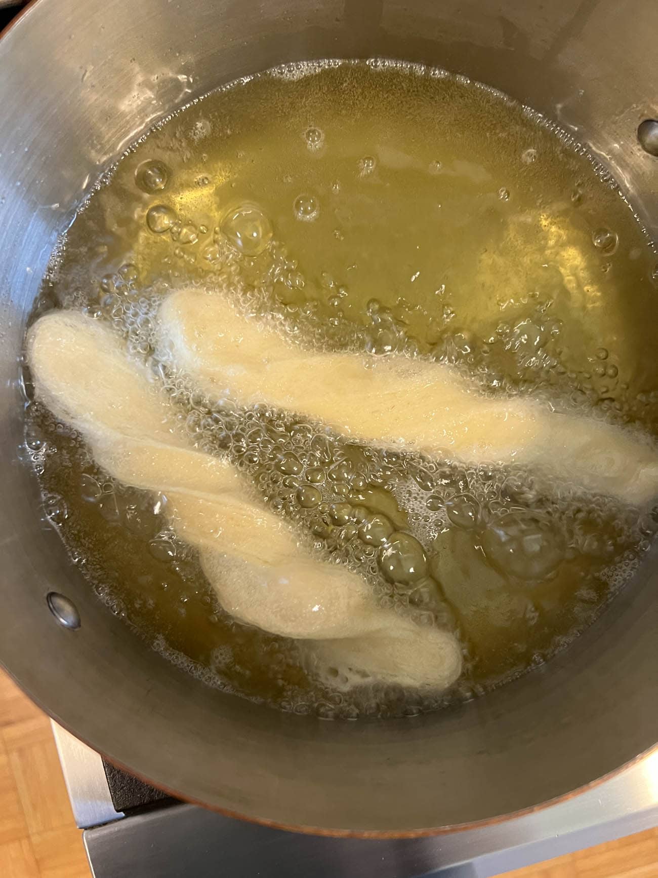 frying croissant twists