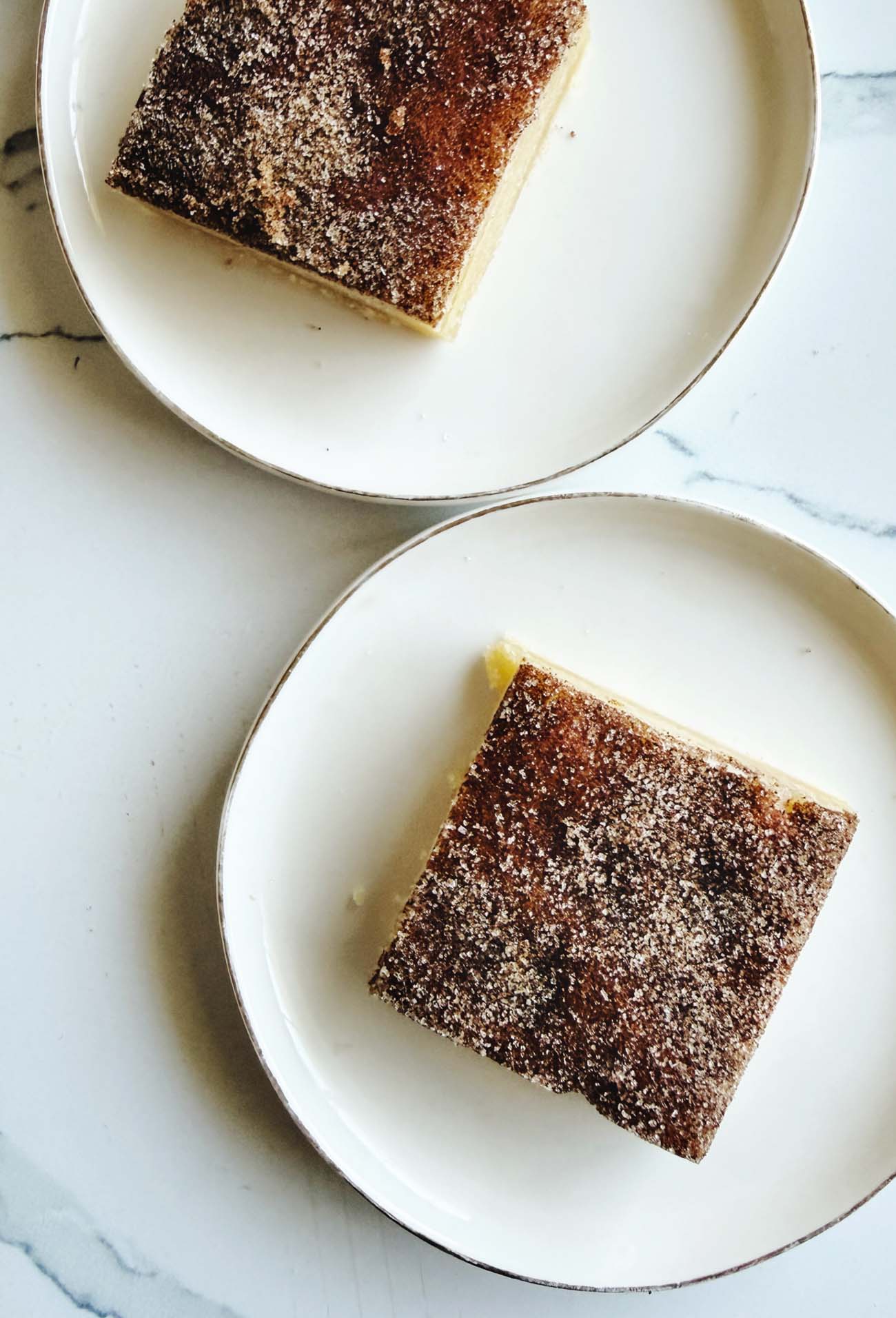 chewy snickerdoodle bars on plates